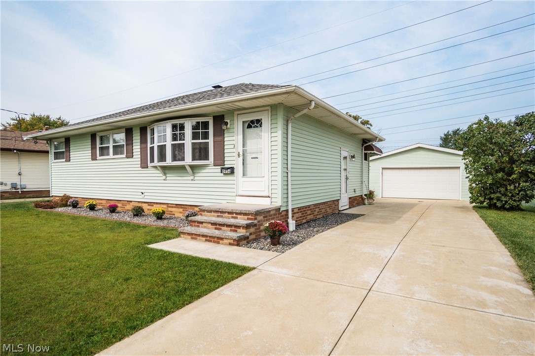 This home has everything you are looking for! Outside there is newer vinyl siding and a newer roof. The windows have all been replaced as well! Even the concrete driveway and huge 2-car garage are in fantastic shape. Also this property offers a huge lot at over a 1/3 of an acre there is plenty of gardening or play space. Inside the front living room is large and the 3 bedrooms are all good size since the home is over 1,000 sqft. Downstairs, the front half of the basement is finished offering lots of great extra space. This fantastic property is ready for you to call it home!