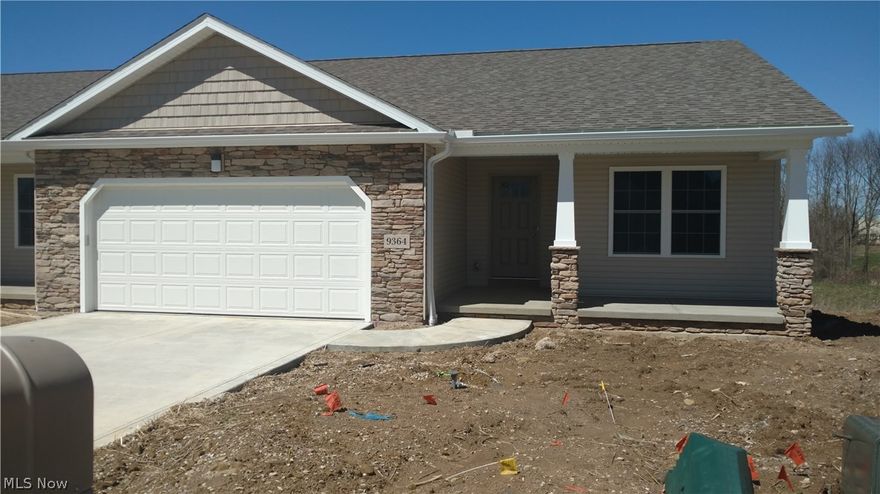 Brand new ranch cluster home, quality built by Gasser builders and beautifully appointed.  Open concept floor plan great room with expansive windows to water and wooded view - all open to kitchen with center island with convenient eating counter plus separate eating area.  Softclose Kraftmaid cabinetry.  Master suite features dressing area, private walk-in shower and water closet plus walk-in closet.  The maintenance free deck is just off the eating area with wonderful views of the nature preserve.  The basement has two finished rooms and stubbed for a bath.  First floor laundry and 2-car garage.  The Villas of Seville are situated on an extensive walking trail, next to a park, within a mile of the I-71/I-76, near restaurants, schools, churches & shopping.  Convenience at it's best!  This unit is one of three models available all of which are almost finished with staggered completion dates Feb - March.  20 + more lots to choose from.  Custom available.