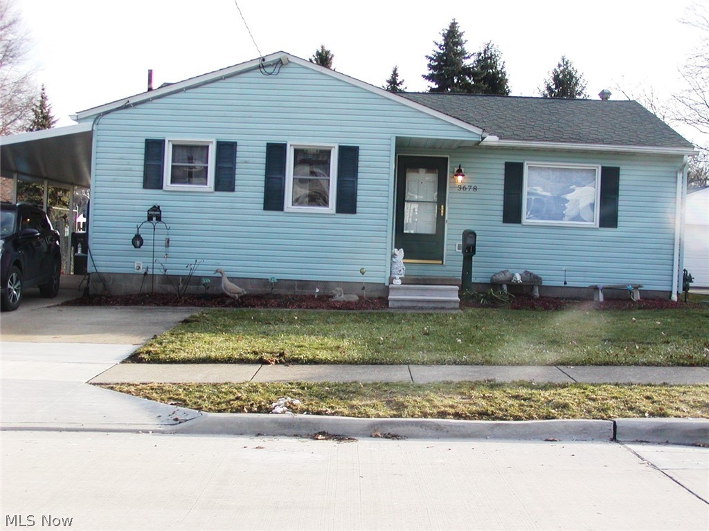 Lot: 52 X 143. Roomy well kept 3 bedroom 1 1/2 bath ranch on fenced lot. 1/2 bath is off the master bedroom. Nice sized kitchen with eating area & appliances. Wood floors under many of the carpeted rooms. Central air. Waterproofed basement with renewable warranty by Ohio State Waterproofing. Replacement windows. Glass block windows in the basement. Carport or large patio area. Paved drive with extra parking pad. America's Preferred Home Warranty included.