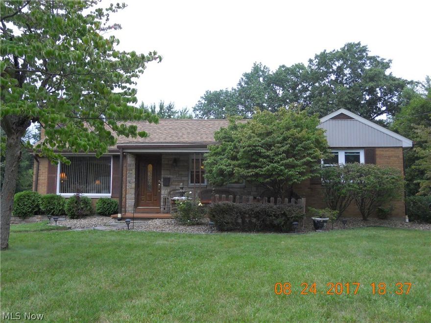 TOPS IN EVERY RESPECT! That's what you'll say when you see this spacious 2 bedroom brick ranch home. Lot size is a real plus being that it is much larger than the ordinary which accommodates for a large 2 car garage and a custom built smoke house.  The moment you enter into the ceramic foyer entry you will experience the open concept to the dining room with hardwood floors and an attractive kitchen with ceramic floor and stainless steel appliances. You will enjoy the sun room and family /media room looking into rear yard setting. Spacious living room with fireplace, up dated 2 full bathrooms, recreation room with fireplace and plenty of storage in the basement. New roof shingles in 2017! Great Value-Condition!