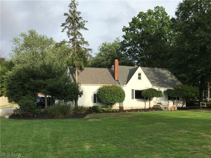 Motivated seller! Don't miss this 5 bedroom, 1.5 bath cape cod.  Fresh paint & flooring throughout.  New stainless steel appliances.  Has an in-law suite that is currently being rented for $650 a month, 752 square feet,  1 bedroom, 1 bath with a 1 car garage. Home has attached garage as well as 2 car carport.  Great investment opportunity, either live in one and rent out the other to help with your mortgage, or rent out both for two rental incomes! Great income property for handy man! Both homes will need a little Tlc.