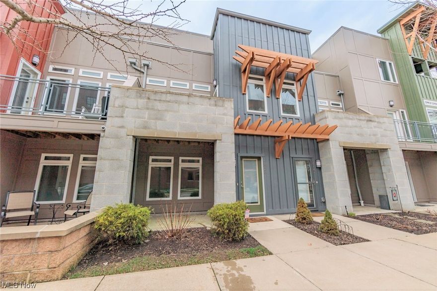 Welcome home to the community of Battery Park. Featuring direct access to Edgewater Park and the shores of Lake Erie while also being just minutes to Gordon Square and downtown.  This spacious townhome features an open main-level floor plan with a well-appointed kitchen featuring all stainless steel appliances, granite counters, a glass tile backsplash, and contemporary cabinetry. The open living and dining space provides access to the first of two private decks. A powder room for guests is also found on this level. The lower level offers a great bonus space with built-in storage perfect for a home office, workout space, or den. The upper level has a spacious master suite that has been expanded from the original layout to optimize every square foot and also has an on-suite bath with a walk-in shower and access to a second private balcony. Also, on this level is a guest room with a privet bath and laundry. There is a private attached two-car garage and this unit has several years of tax