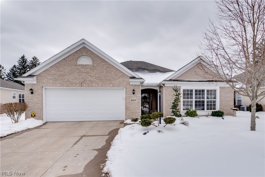 Gorgeous ranch cluster home in a fabulous location! This Tuscany model is located in the desirable Stratford Green neighborhood surrounded by Mayfair Country Club. The open floor plan boast over 2,000 sq ft of living area. The great room features high ceilings and windows with amazing natural light all around. The great room has a gas log fireplace and blower. Check out the brand new mantle, marble fireplace surround, and electric blinds for the transom windows. The large and spacious kitchen comes fully applianced and features new granite countertops, cherry cabinets, center island, vaulted ceiling, desk, backsplash, and under cabinet/over cabinet lighting. The first floor has three large bedrooms updated with wood flooring, two bathrooms, and plenty of closet spaces. Both bathrooms have brand new granite countertops. The master bathroom has a walk-in shower and garden tub complete with new ceramic tile and backsplash. Off the kitchen is the first-floor laundry room.  As you exit thro