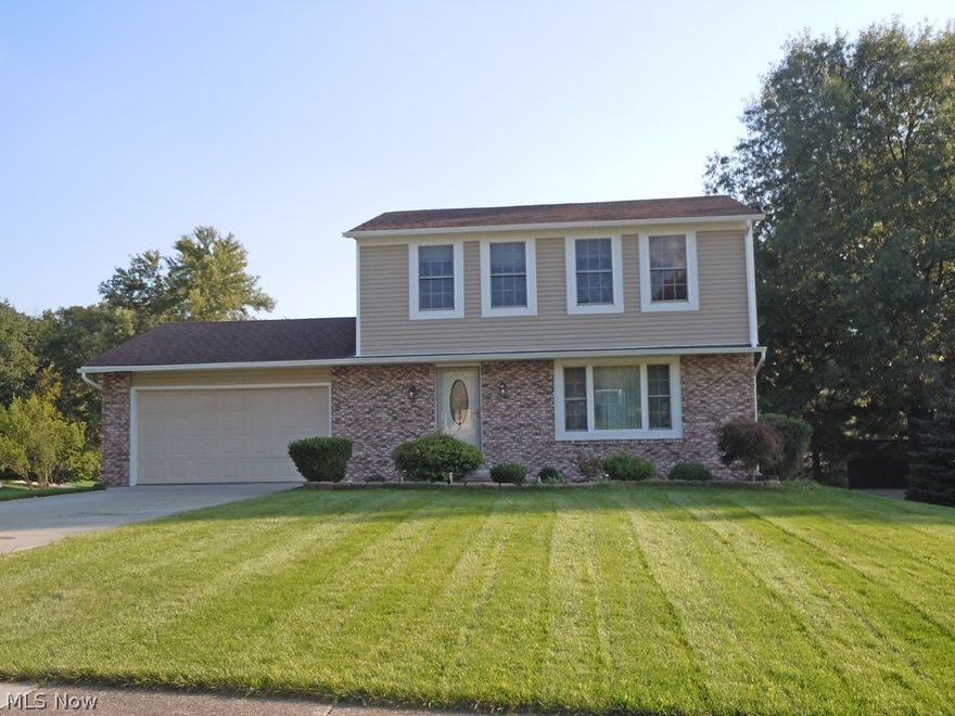 Beautiful 3 bedroom, 2 ½ bath colonial with many updates.  These include: vinyl siding, driveway, roof, furnace, electrical, and granite kitchen countertops.  Featuring an open foyer that leads to the living room, French doors separating the kitchen and living room, a family room with a fireplace,  and a sliding door that walks out to the large private deck.  The kitchen is complete with all appliances, has ceramic flooring, dinette area, and overlooks the family room. There is also a guest bath on this floor.  The upstairs offers a full, updated bath, large master suite, and 2 additional bedrooms.  The full basement has a finished recreation room, a full bath, a spacious laundry room, and a playroom or office.  Completing this offering is a 2-car attached garage, a wood deck, and a deep yard.  Close to the North Royalton schools, shopping, and the newly built YMCA & Library.   Don’t miss out!