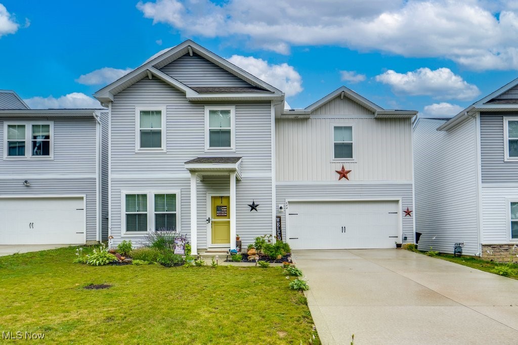 Beautiful newly constructed home (2022) located at the Crossings at Auld Farms! This charming home boasts 3 bedrooms, including a large master bedroom with a walk-in closet and a master bathroom. The first floor has a half bath for convenience with an open floor plan. This home has so much natural light making you feel right at home, bringing in all of the neutral colors of the flooring, paint, and cabinets. Other carefully thought-out upgrades are granite counters in the kitchen and subway tile in the bathroom showers, making this home stand out compared to some other models. A patio off the back door leads you to a fenced-in yard with a pergola, perfect for evening nights and relaxing or entertaining. This home offers peace of mind being built in 2022, and also, it comes with a tax abatement until 2037. Yearly real estate taxes are only $1,093 making this new home very affordable. All new LED kitchen appliances add an extra bonus. New ceiling fans and new dining room light, as well as a new screen door installed, and landscaping upgraded. Sidewalks make this area great for walks with your pup or just to take a stroll. Less than a half mile from the recently renovated Perkins Woods Pool that is open to the public during season, perfect place to cool off or hang out with friends. Close to Cleveland Clinic Akron General, Akron Children's Hospital, Summa, University of Akron, the Akron Zoo, and so much more. This home qualifies for a Zero-down FHA Loan and a First Time Buyer Mortgage Tax Credit Program. Reach out for more details. Don't wait to make this home your own.