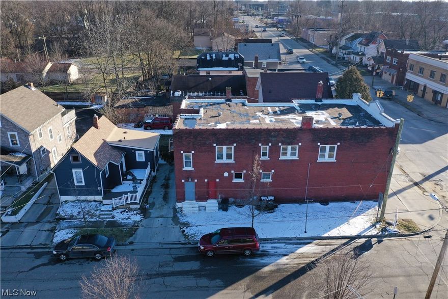 871 Brown St, 873 Browns St, 869 Brown St, 869.5 Brown St & 538 Baird St Akron, OH 44311 is a fantastic investment opportunity! Investment consists of 5 separate units in 2 different structures, beautiful brick building known as 871-873 & 869-869.5 Brown St is a Mixed Use Building plus Full Basement, 2 Ground Floor Retail Units with Gas Heat, central air conditioning, public water & sewer. One unit is larger, few different uses over the years including retail stores, appliance store, barber shop & more uses! 2 additional large residential apartments on the 2nd floor of the building to house investment tenants! These are 2 @ 2-bedroom residences with many updates as well. The tall ceilings in all units make this property have very viable options to make investment income. There is a 5th investment rental, BONUS, Single Family Home on the same parcel known as 538 Baird St which is also used as a rental income property! The home was updated in 2020 with flooring, kitchen, countertops, paint, siding & gutters, has an unfinished basement, has one bedroom and one bathroom. All current leases are month to month. There are 3 newer furnaces & newer hot water heater. When fully rented, these units were bringing in $6,300 per month! The rentable square footage consists of 5,386 square feet, which includes 4,746 sf in the 2-story multi use brick building as well as 540 sf in the single family dwelling & the properties lot has 40' of frontage on Brown St which is the retail store front and 120'of frontage on Baird Street for additional entries & the single family home. There is 4,800 square feet of lot. There are municipal sidewalks, street lights, gutters & curbs. The Appraiser said the effective age of the property was 20 years old with 30 more years of useful years without needing any major overhauling nor remodeling, however, roof has been patched & will eventually need a roof. Current roof is a flat roof or could have a gable roof installed. Property Sold As Is, Many Uses!