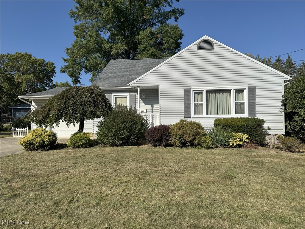 Start packing! Well maintained 3 bedroom, 1 1/2 bath cape on Barberton's west side. Gorgeous hardwood floors in living room and the two first floor bedrooms. Bright and cheerful eat-in kitchen with oak cabinets and appliances. 1st Floor bath with tub/shower. 2nd Floor features a 13x33 bedroom with two cedar closets. Partially finished basement with cabinets; shower, toilet and sink. New shingles September 2025, HWT 2024. 96x240 flat lot, perfect for a swimming pool or hosting picnics on the concrete patio. Shed. Bedroom #2 has a stackable washer and dryer that will convey.