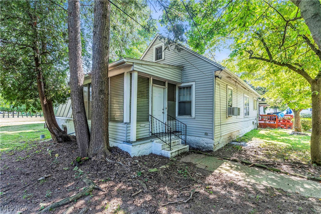 Here's your chance to become a real estate investor overnight! This tenant-occupied 3-bedroom, 1-bathroom bungalow in Euclid, Ohio is generating $1,425 per month with a secure 12-month lease in place! Built in 1921, this 1,206 sqft single-family home features vinyl siding, a classic bungalow style, and an attached greenhouse. Additional space includes an unfinished attic, basement, two enclosed porches, and a front deck—perfect for future updates or rental growth.
Inside, the home has fresh neutral paint and beautifully refinished hardwood floors! A newer hot water tank and tenant-owned appliances make this a low-maintenance investment with minimal upfront costs.
Located in Euclid, this property offers convenient access to downtown Cleveland, major highways, and local amenities including shopping, dining, and parks. The area has a strong rental market with steady demand, making it an ideal location for investors seeking reliable cash flow and long-term appreciation.
Professional management with rehab services specifically available for remote investors. Ask for details!