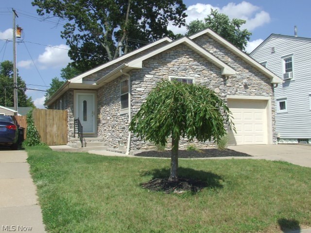 Beautiful multi-gray stone ranch in the heart of Firestone Park! Become a "Parkee" and enjoy this open concept newer construction home (2004). Loads of curb appeal as you come up the curved walkway leading to the welcoming front door. Come into the neutral living room to relax or gather at the breakfast bar that divides it from the open kitchen. This eat-in kitchen is command central, with views of the outside yard and deck, and the living room. The dining area also has ceramic floors and French doors leading to the large, covered, 16x13 wood deck and fenced back yard. A first floor master suite with a full closet and full bath. Second bedroom just off the kitchen with access to the full main bath. First floor laundry for convenience. Full basement that could be finished for your own private his or her cave. Make an appointment to see this well maintained home today!