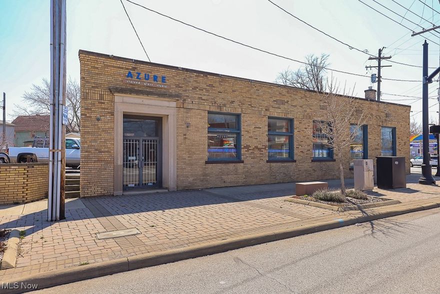 Fantastic opportunity to own a building in the heart of the Waterloo Arts District. Free standing Brick building built in the 1920's welcomes you to the district. Easy access to I90. This special building could be used for many types of businesses, gallery space, office space, local retail your vision your space! Full basement provides additional flexibility. How about a rooftop patio? Parking lot included.