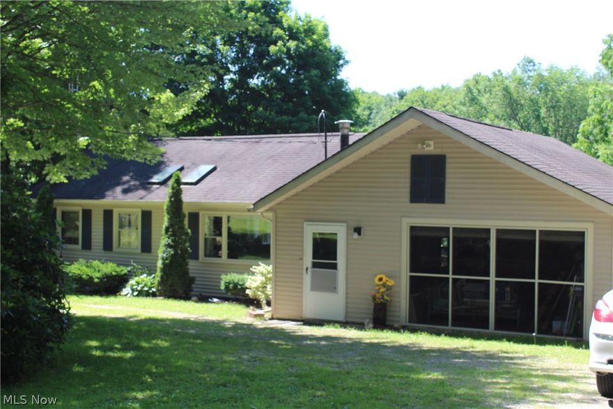 Canal front ranch leading to Pymatuning Lake.  2 bedrooms down and 2 loft bedrooms up.  Open concept living room, kitchen and dining area.  2 car garage could be family room.  2 out buildings.  Great summer getaway or year round home.