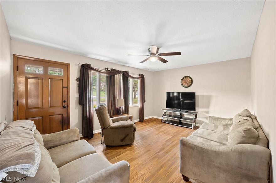 Larks sing melodiously, even when flying, unlike other birds. This indicates cheerfulness and reminds us to find joy in our own lives. It is said that seeing a lark is good news for its viewer, because the lark brings abundance and impending harvest. Bird watchers, desperate to spot a New Franklin Lark, grab your binoculars and look over there, perched just off of Nimisila Rd, sits a beautiful bird, singing an unusual tune "buy me now, before I'm gone, I promise you it won't be long. There is no offer we won't weigh -cash, conventional, or FHA." This is the ever popular ranch style lark, she's a big bird w/more than 1700 sqft. of finished area. Look at her all brick exterior and her perfectly rectangular lot, measuring 1/2 acre. Would you look at that, she has a two car garage and a big deck on her backside.... she's beautiful. Such abundance. Its harvest has yielded 3 bedrooms, 1.5 renovated baths, a large finished basement, and has fresh paint throughout, new light fixtures/fans, an