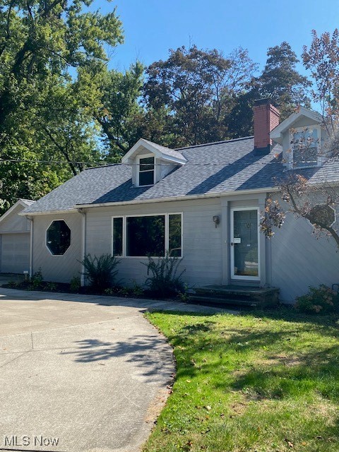 **** ROOF 2025, 4 skylights (replaced)2025, front of home waterproofed in April 2024 *** Hardwood floors in LR are damaged and home previously purchased as such. FR could be used as the master suite with its own full bath. Wet bar or butler pantry adds to the kitchen space. Over an acre of land in Willoughby Hills with a small creek on side of yard. Home being SOLAD AS IS.