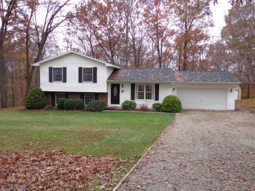 Great country setting just minutes to town.  This beautiful updated split level home has 3 bedrooms, 2 full baths and attached 2 car garage.  It is located on a large wooded lot (.915 acres) on a dead end street.  Recent updates include new carpet and flooring, roof, furnace, ac unit, kitchen counter top with tile back splash, kitchen sink, light fixtures, patio door, front door.  For all your storage needs, there is a 24 X 24 (2 story) workshop/garage with new HVAC unit.