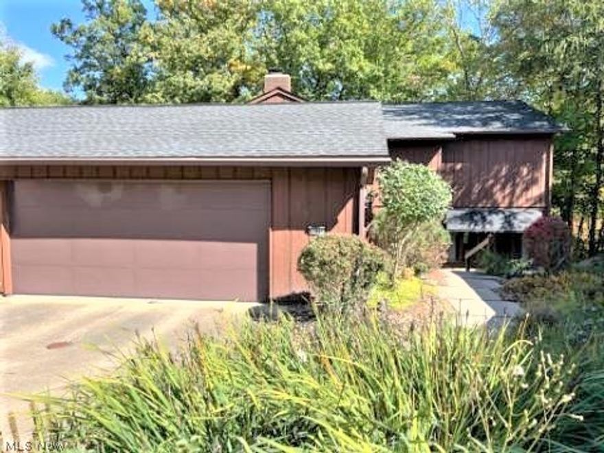 Well maintained spacious colonial-style condo located in the sought after Cliffs Condominiums. Large eat-in kitchen with double ovens, cook top, indoor grill and plenty of cabinet space. The cozy family room has wood floors, brick fireplace, bookshelves, and sliding glass doors with outstanding views over looking the wooded hillside. Very generous sized bedrooms and loads of storage on the second floor. Master bedroom has his and her closets, lighted vanity table, and master bath with a separate steam shower. Oversized two car garage is off of the laundry room with plenty of storage. This home is equipped with 2 furnaces, 2 hot water tanks, and Anderson windows. This unit is the largest unit located in the Cliff Condos and also has one of the longest driveways. Square footage and location make this a rare opportunity. Be the first to see, call today