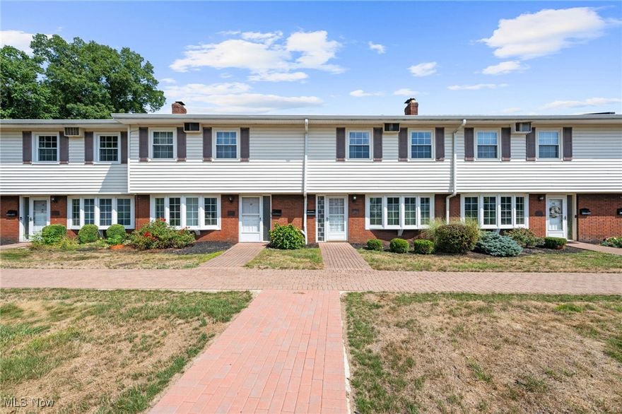 Follow a charming brick walkway to the entrance of this spacious and well-maintained townhome located in the desirable Meadowlawn Community. Step inside to the welcoming foyer featuring a beautiful curved staircase and a large living room with newer windows, custom built-ins, brand new carpet and a gracious woodburning fireplace - perfect for relaxing or entertaining. The open layout continues into a nicely sized tiled dining area and an updated kitchen complete with all appliances. Just off the kitchen is a cozy den that opens to a private patio, offering a great space for outdoor enjoyment. The attached two car garage is conveniently accessible from the den, and a main floor half bath and laundry room add to the home's functionality. Upstairs, you'll find three generous bedrooms, including a spacious primary suite with a large closet and a renovated en suite bath featuring a stylish tiled shower. The two additional bedrooms share an updated full bath, making this layout ideal. With ample living space, modern updates and a location in an amenity-rich community - opportunities like this don't come around often. Schedule your showing today and make this wonderful home yours!