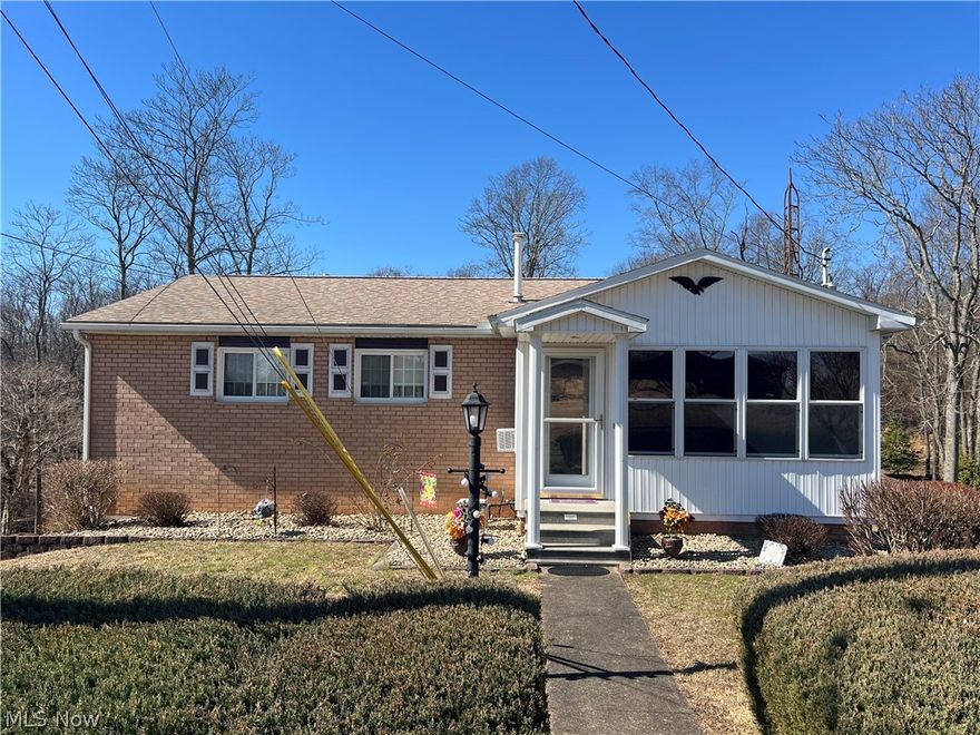One owner brick ranch. If you enjoy spending time outside this could be the one you've been waiting on.  This house has been well cared for and maintained.  The furnace, air conditioning and windows are all under ten years old.  Hardwood under the carpet just ready to be revealed, to include the dining area and main bath.  Family room with an Ashley woodburning fire insert.  Huge laundry area with epoxy flooring along with the garage.  Both Amish-installed.  My favorite is the 22x12 covered, screened deck with blinds overlooking this exceptionally private wooded setting.  Front of the house with the most inviting sunroom.  Professional photos will be added the middle of this week.