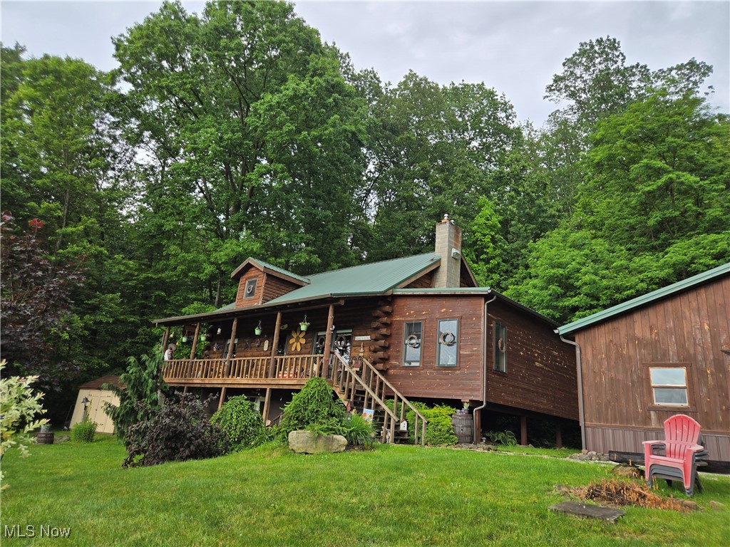 Panoramic, breathtaking views, peaceful serenity of country living - all from your cozy front porch! You can enjoy coffee in your favorite chair, in the still of the morning and watch the sun rise above the tree line. The home has been loved and is decorated to perfection! Relax to the sound of the rain on the metal roof while listening to the wildlife and enjoying the beauty of the seasons. There is also a privacy gate at the entrance of the driveway.
Atwood Lake is just minutes away!
Oversized 3-stall garage is fully finished, insulated with a sauna inside for relaxation.
The wood burner in the basement is connected to the ductwork for heating the home.
NO Wholesalers.
Internet - Starlink, AT& T, T-mobile are currently available, Frontier dial up too.
Carroll co-op budget is $340
Lean to in the pasture.
Water and Electric to the barn.
Sellers have the home checked twice a year - spring & fall by an exterminator.
Private ground. Large garden area to grow your vegetables.
Exclude the large square rock by the fire pit and the bar stools in the kitchen.
Subject to the sellers finding suitable housing.
Buyers must have either pre-approval letter or proof of funds.