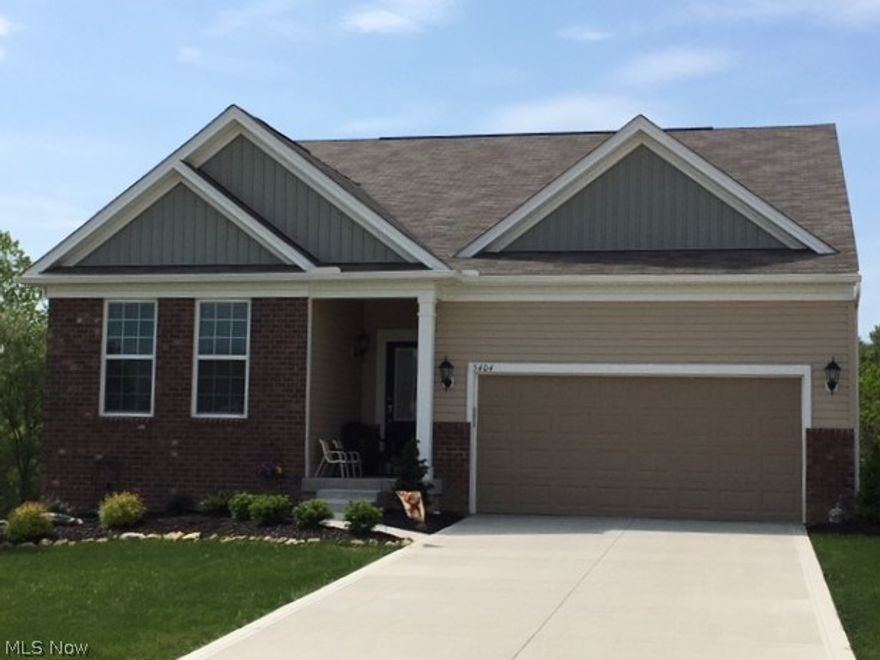 Pulte Homes Ascend floorplan ready for September Move-In at Forest Creek, Medina County’s most desired limited maintenance community. Located in York Township with low, low property tax rates & no city or RITA income tax! Enjoy your over ¼ acre private home site backing to woods, with gorgeous views! Enter through the massive, elegant foyer with Shaw LVT flooring & classic trim package, leading to the huge, trend forward living area consisting of kitchen with 13’ island, gathering room with fireplace & large adjoining dining area. Relax in the bright & airy sunroom leading to the patio.  Nine foot ceilings throughout add to the spacious & open feel. Spectacular kitchen with upgraded cabinets, granite counters, stainless steel appliances & tile backsplash is the ultimate space for entertaining. The owner’s suite leaves nothing to be desired with the large, bright bedroom & oversized en suite full bath with 5’ shower, double sinks & private water closet. Primp at the separate 5’ makeup v