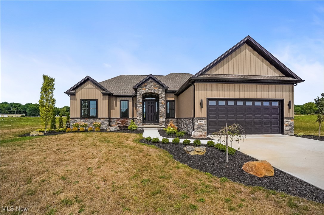 Stunning New Construction in Canfield Township’s Premier Communities - Millennial Moments!
Welcome to one of Canfield Township’s most exciting new neighborhoods! This beautifully crafted new construction home offers luxurious living in a peaceful, upscale setting.
Step inside to an open-concept floor plan with soaring 10 foot ceilings throughout—perfect for entertaining. The gourmet kitchen is a true showstopper, featuring a built-in buffet, large pantry, breakfast bar, spacious dinette area, stylish subway tile backsplash, and top-of-the-line KitchenAid appliances, including a gas range with oven and a distinctive Faber hood.
The spacious master suite boasts a tray ceiling, oak tongue-and-groove flooring, and a luxurious en suite bath with a large tiled shower, walk-in closet, and elegant tile flooring.
Please see Supplements to view Fact Sheet
Additional highlights include:
Pella windows and doors throughout
13-course basement (plumbed for an additional bath) with plenty of storage or finishing potential
8-ft interior doors for added elegance
Flexible office/4th bedroom option
Quartz countertops & Merillat cabinetry
Baird Brothers doors and trim
Pella VinylDH 250 series windows with insulated low E glass w/insect screens
Ceramic tile in all bathrooms, foyer, and entry
Concrete driveway and walkway
22kw Generac generator
Fully insulated garage with EV charger hookup
This home blends luxury, function, and future-ready features—ready for you to make it your own.
