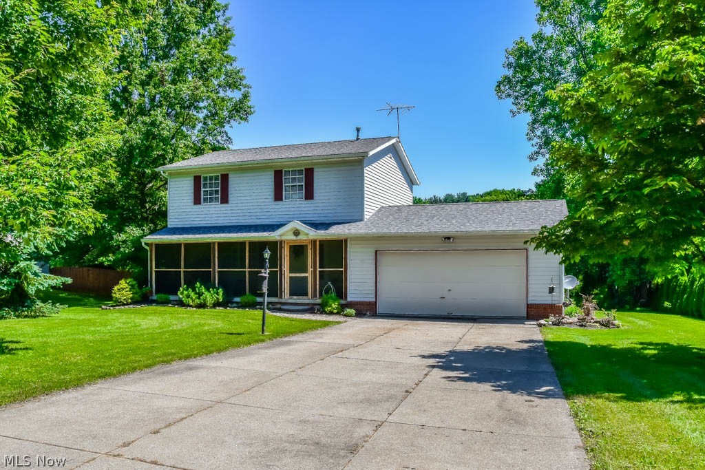 Beautiful 3 bedroom, 1.5 bath colonial with a finished lower level in Lake schools! Tons of updates including the flooring throughout most of the home, fresh paint, new light fixtures, new hardware, bathroom vanity, landscaping, plumbing and electrical upgrades, hot water tank, sump pump, kitchen appliances, water softener and more! Whip up your favorite recipes in the fully applianced kitchen with an electric oven/range, a large farm-style sink, pantry, granite countertops and a built-in breakfast bar great for crafting. Host holiday meals in the formal dining room with a door to the back deck then gather in the spacious living room with a coat closet. Convenient half bath on the main level, too. Upstairs, the master bedroom has 2 closets and direct access to the full bath with granite counters and a medicine cabinet. There are 2 additional bedrooms. Lots of storage and closet space throughout the house. The lower level offers a finished rec room with high ceilings for over 1,500 fini