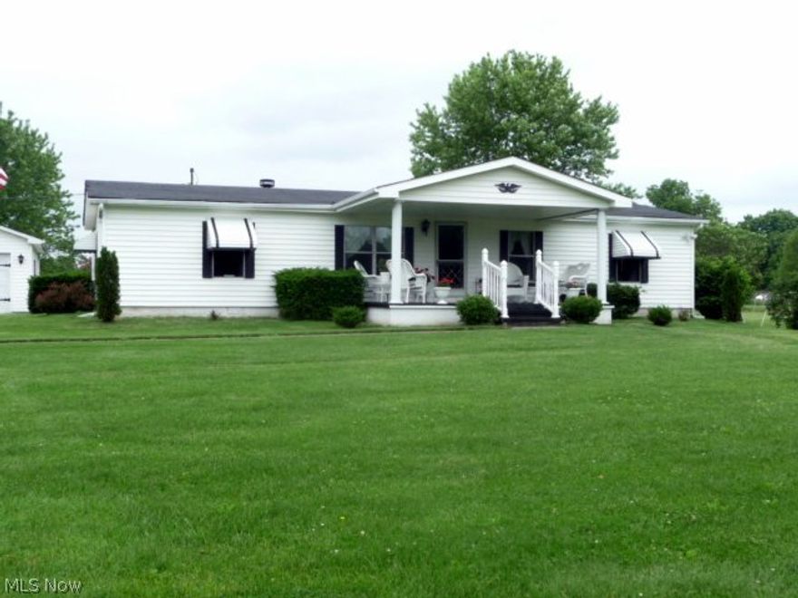Great private setting from this manufactured home that's close to Salt Fork and Morning Glory docks. 3 br, 2 full baths on a block foundation with covered front and back porch with great views on the 2.9 acres of flat land. There's a 2 car detached garage with openers and shed for added storage. Both had new roof a year ago. New roof on the house 5 years ago, hot water tank and county water added and a new septic system 3 years ago. There's several fruit trees, grape arbor and spacious garden area too and several shade trees to relax under. This lovely home has a gas fireplace, formal dining room, spacious living room and all bedrooms have walk-in closets. All appliances are negotiable. The propane tank is 250 gallons and rented by AmeriGas. There's also a Tennessee Gas line that crosses the property beside the garage. This one is a must see inside this well maintained one story home. Current taxes include homestead reduction.
