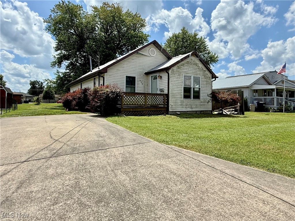Investor Special! Buy Low, Build Equity Fast! Looking for your next big project? This VIENNA RANCH is loaded with potential and ready for a transformation. Sitting on a level lot with alley access, a great backyard, newer windows, and low-maintenance vinyl siding, the bones are solid...you bring the muscle. Vaulted ceilings in the living room give this place extra wow factor once polished up. Priced to sell. This is your chance to snag the worst house in the neighborhood and turn it into one of the best. Properties like this don’t stick around! Being sold as is-where is!