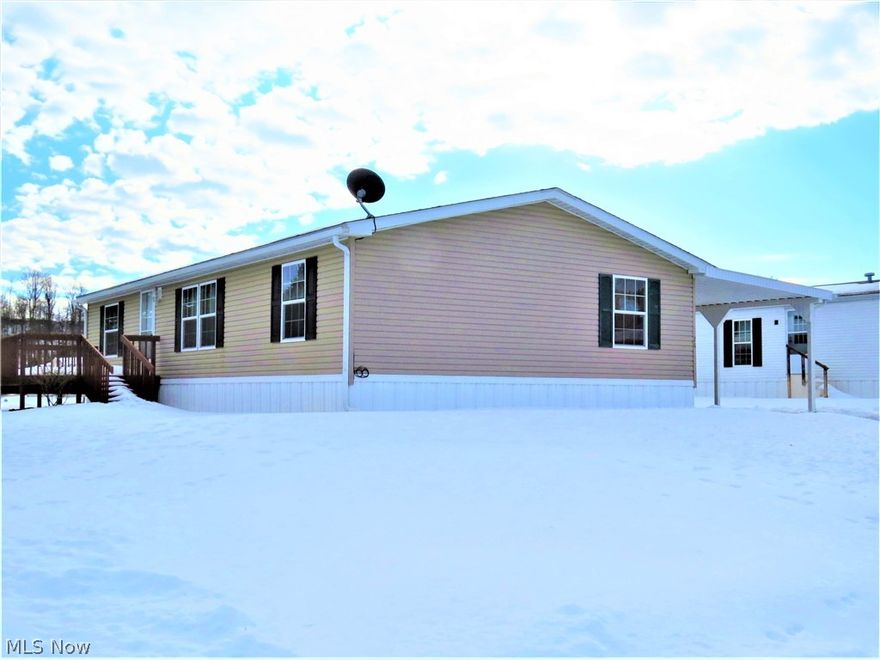 2007 Skyline 3 Bedroom, 2 Bath Manufactured Home In Woodale Village at Minerva! Woodale Village is a 55 years and up community with water, sewer, and road maintenance included. Current lot rent is $265 per month. This ranch home of 1248 sq. ft. features a large eat-in kitchen, master bath with soaking tub and walk-in shower, all appliances, large closets, front deck, storage barn, and full length 12' x 48' carport or patio with concrete floor. There's also a good wooden ramp for wheelchair access. Home is well maintained and ready to live in. Homeowners are responsible for lot mowing and driveway snow removal. This sale is for the manufactured home only, not real estate. Call to schedule your showing today!