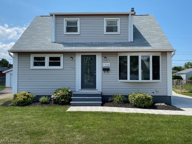 Welcome to this impeccably remodeled from top to bottom 3 bedrooms and 3 baths cape cod style home. Renovations were done with attention to details. You will fall in love with the tremendous upgrades throughout! This gorgeous home is moved in ready and awaits its new owner. The kitchen is modern and the bathrooms are trendy. The house has new roof shingles, new concrete driveway, new flooring throughout, new windows, new exterior doors, new interior doors and moldings, new carriage overhead garage door. The second floor offers a huge bedroom and a full bathroom! Your guests will love to be entertained in the finished lower level, which offers a rec. room, laundry and a bathroom. Definitely not a flip house but a truly renovated HOME. Call today for a private tour.