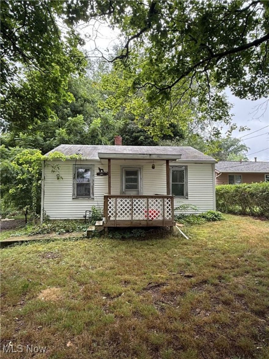 Investment special! This unique home is ready for a complete makeover which has foundation walls up for a possible addition added on. That would maximize the size and square footage it has to offer. This house has two parcels with the home on one and a 2 car garage on the other. Request a showing today and get this house the love it needs.