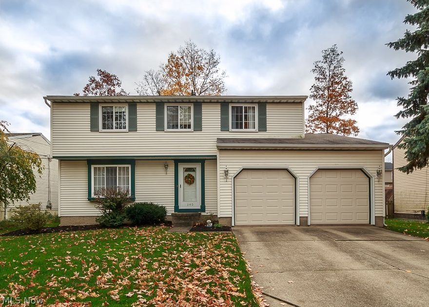 Lovely colonial, beautiful sun porch, 20x13 deck and fenced in backyard.  Quiet cul-de-sac street. Walking distance to school. This home features many newer updates including new garage doors, hot water tank, appliances and more.