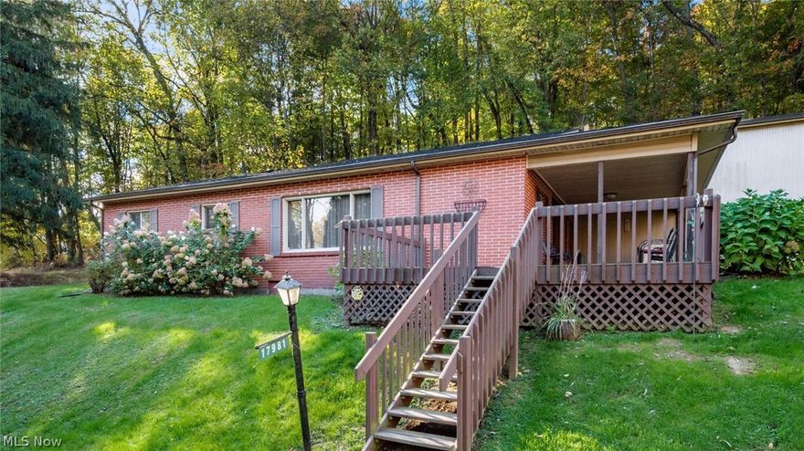 A front row seat to peace and quiet. Settled on over 8 private acres in the beautiful countryside within River View School District, this inviting 3-bedroom, 2-bath ranch offers the privacy you crave with the convenience of being close to town. Perched among mature foliage with plenty of space to unwind, enjoy summer BBQs and quiet mornings from the large deck and covered seating area overlooking the yard. There's plenty of room to garden, explore, or simply enjoy your own slice of country paradise.

Inside, the home was rebuilt in 2012 with thoughtful updates throughout. The kitchen features rich dark wood cabinetry, granite countertops, tile backsplash, peninsula bar seating, and appliances that stay. The living room fireplace with stone surround and rustic wooden mantle creates a cozy gathering space. A bonus room just off the entryway makes an ideal home office or library.

The primary suite offers two closets and a private bath with jet tub and walk-in shower. A convenient mudroom/laundry area sits just off the living space and connects to the oversized 32x32 garage offering ample room for vehicles, storage, or projects.

All known mineral rights will transfer. With over 8 acres to explore, including wooded acreage and wildlife filling the area, this property offers endless opportunities to enjoy nature right outside your door.

Also included is an additional home in need of restoration and significant repair, offering a unique opportunity for customization . Whether removed for a new barn, garage, or outbuilding, or restored for potential rental income or space for friends or family. This secondary home offers 1,040 square feet of potential with 3 bedrooms and 1 bath. Peaceful country living with space, privacy, and potential just minutes from town.