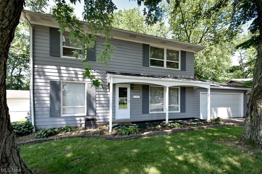 Welcome Home! This Spacious Colonial in Ivy Park Features over 1900 Square Feet of Total Living Space and an Attached Two Car Garage. Enter into the Bright Living Room Which Opens to a Flex Space for a Family Room or Dining Area. The Refreshed Kitchen Offers a Huge Pantry, Loads of Counter Space, Access to the Backyard and All Appliances Stay! (Refrigerator and Dishwasher 2021) Around the Corner is a Convenient Half Bath. A Formal Dining Room Rounds out the First Floor. Step Upstairs to the Large Primary Bedroom with a Wall of Closets. Three Additional Bedrooms Provide Tons of Space; All with Ample Closets and Beautiful Hardwood Flooring. The Full Bathroom has a Newer Vanity and Commode and a Deep Linen Closet.  Huge Rec Room, Tidy Laundy Area and Separate Flex Space for an Office or Storage Completes the Dry Lower Level.  (Furnace 2021; Sump Pump 2015) Fully Fenced in Backyard with Deck, Low Maintenance Landscaping and a Play Structure.  (Roof 2017) One of the Most Sought After Neighb