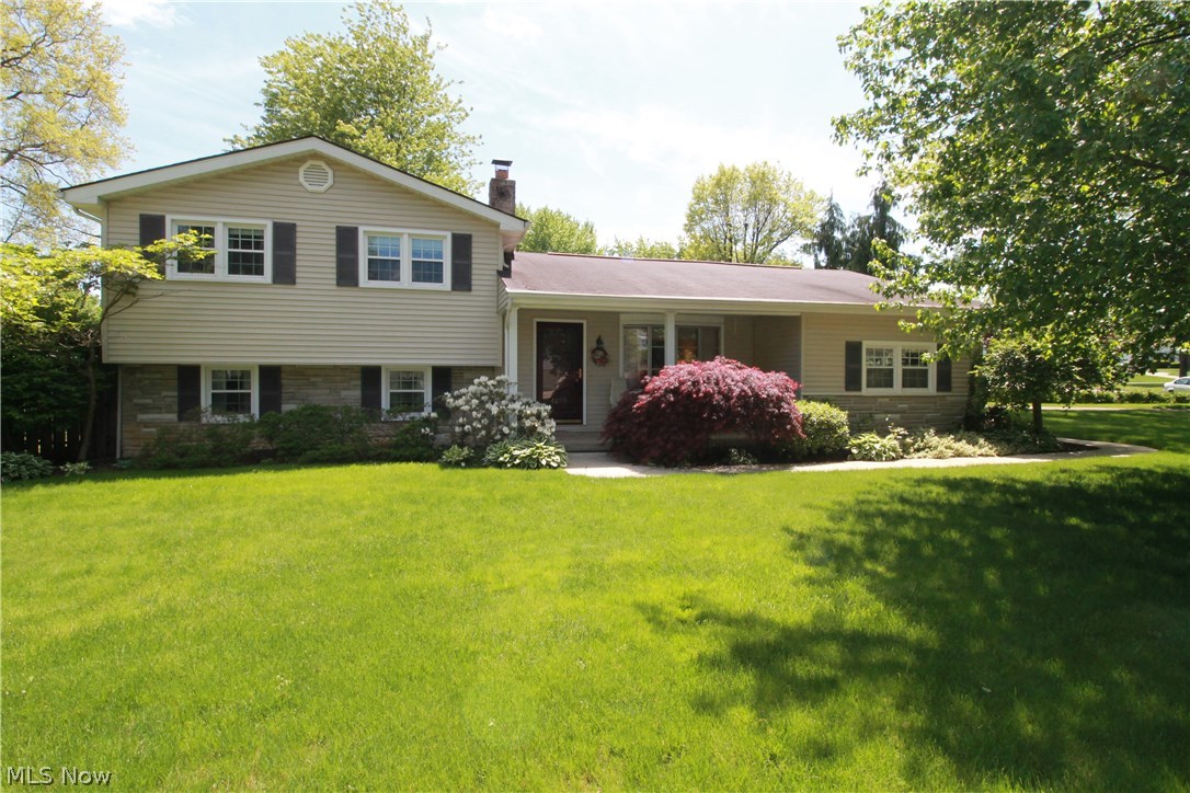 WELCOME HOME TO 4259 Carlisle Ave.! This gorgeous well cared for home has a beautiful dining room/sun room addition with lots of windows and glass door to let in all the natural light of the day. Open to the kitchen and living room, the kitchen has been completely remodeled with custom built cabinets and gleaming hardwood floors with lots of counter space and cabinets for all your kitchen needs. Large living room with bow window, and hardwood flooring is the perfect room for family gatherings and entertaining. Upstairs takes you to a full bath, the master suite with bathroom access from the master. There are two additional bedrooms and a very large linen closet for storage. The lower level takes you down to the oversized family room with so much room possibly a great media room/office area as well. There are also two large storage closets off to the side. If you would like to go out and enjoy the outdoors there is a door for access to the outside. The basement area has a half bat