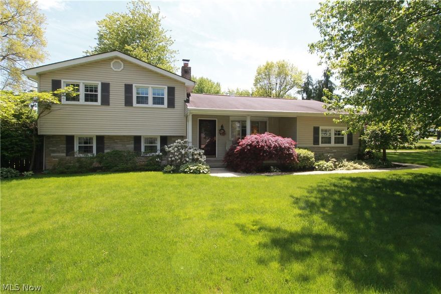 WELCOME HOME TO 4259 Carlisle Ave.! This gorgeous well cared for home has a beautiful dining room/sun room addition with lots of windows and glass door to let in all the natural light of the day. Open to the kitchen and living room, the kitchen has been completely remodeled with custom built cabinets and gleaming hardwood floors with lots of counter space and cabinets for all your kitchen needs. Large living room with bow window, and hardwood flooring is the perfect room for family gatherings and entertaining.  Upstairs takes you to a full bath, the master suite with bathroom access from the master.  There are two additional bedrooms and a very large linen closet for storage.  The lower level takes you down to the oversized family room with so much room possibly a great media room/office area as well.  There are also two large storage closets off to the side.  If you would like to go out and enjoy the outdoors there is a door for access to the outside.  The basement area has a half bat