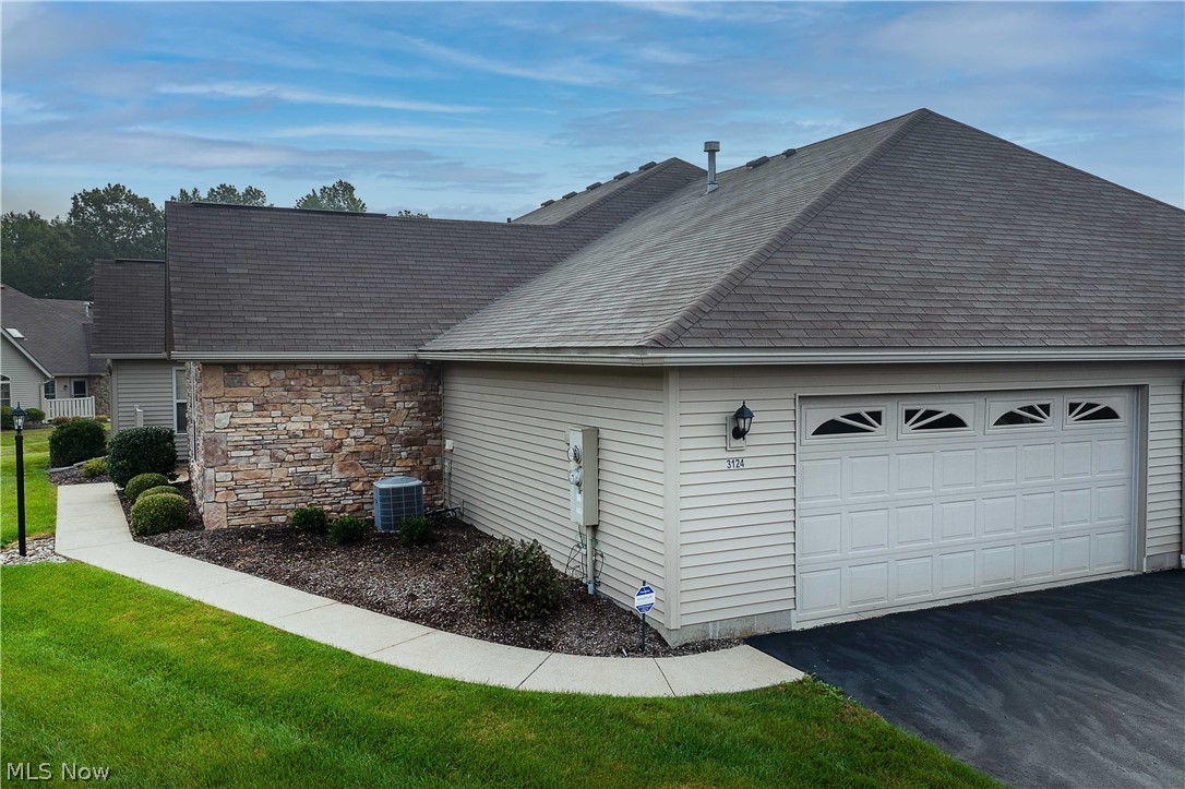 This ranch-style condo on desirable Fiddler’s Creek in North Canton is in mint condition. Spacious, open, and airy with vaulted ceilings, skylights, an abundance of storage, and was built with convenience and comfort in mind. Upon entering this fabulous home, you are greeted by a spacious open great room with vaulted ceilings, double skylights, and a dining area with recessed lighting. The kitchen is open to the great room and dinette and offers a breakfast bar, plenty of cabinets, a pull-out pantry, and a beautiful tile backsplash. The master suite has a private bath with a walk-in shower, a walk-in closet (7x8), and a linen closet. The lovely sunroom can be used as an office. Adjacent to the kitchen is the laundry with extra cabinets and a closet for storage. The two-car garage has additional double closets for extra storage. Enjoy the cozy private patio on beautiful summer days—great North Canton location, close to the expressway, shopping, restaurants, and airport. Make your appoin