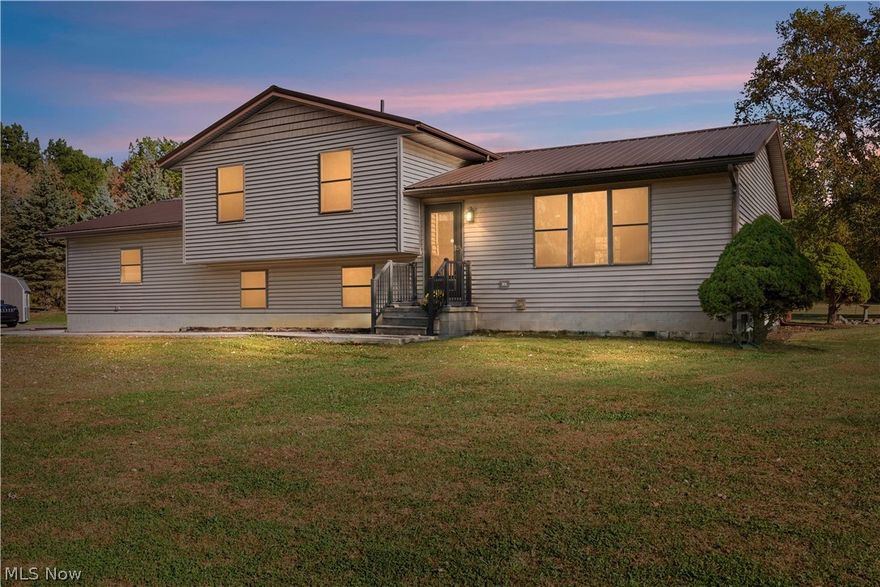 Motivated Sellers!! Welcome home to 6760 Mason Rd! This spacious tri-level home sits on nearly 8 acres, offering plenty of room to spread out, explore, and enjoy the outdoors. You’ll love the feeling of privacy while still being just minutes from town and the highway for an easy commute. Step inside to find a bright, open main level with new vinyl flooring, and a cozy vibe that feels instantly like home. The new wood stove adds warmth and charm, making it the perfect spot to relax on chilly nights. The upper level is open and inviting and the kitchen provides newer appliances, granite counter tops and plenty of cabinet space. On the third level there are two bedrooms, a full bathroom and a huge master bedroom with ensuite that includes a large tiled walk-in shower. This home also has a full basement that gives you tons of storage and endless possibilities... think game room, home gym, or workshop! You’ll also find new solar panels with Generac batteries that saves on utility bills, a new sump pump with battery backup, and many other updates throughout that make this home efficient and worry-free. Outside, there’s space for everyone and everything; enjoy the back deck, additional storage with the 20x12 shed, a 20x12 garage stall, and a nice outdoor awning for relaxing, entertaining or storing that boat!. With so much land, there’s room for gardening, pets, bonfires, and entertaining. This property truly has so many possibilities...whether you’re looking for a family home, a private retreat, or a place to grow into, this Berlin Heights beauty has it all. All appliances stay and sellers are offering a one year home warranty. Hurry and schedule your showing today!