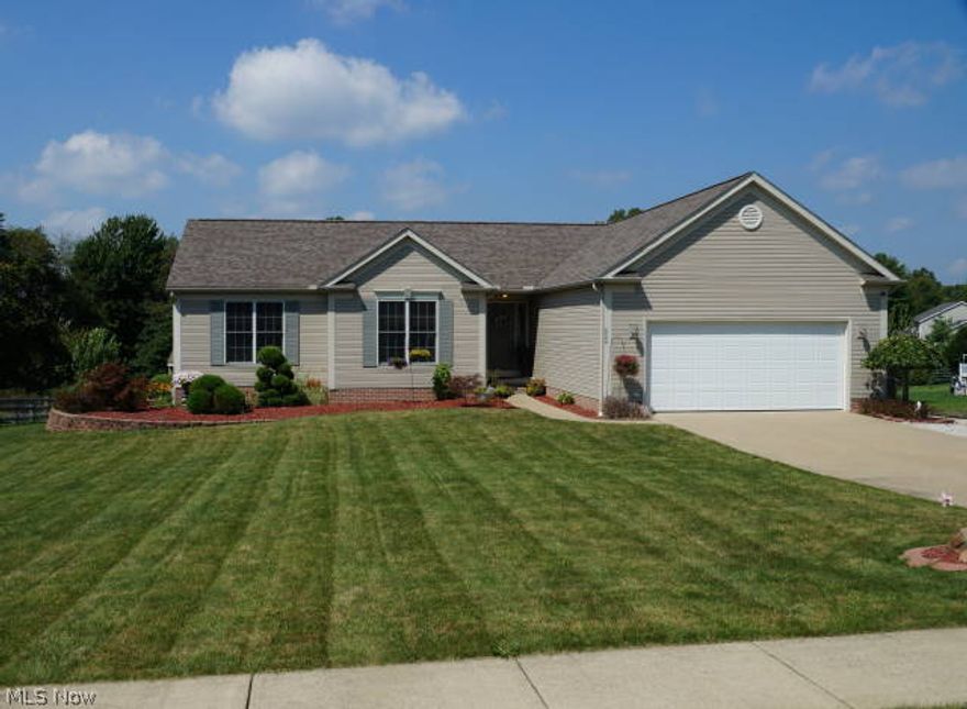 Come check out this lovely 3 bedroom 2 full bath ranch home situated on .854 acres in Brimfield.  Open floor plan with cathedral ceilings throughout the great room, kitchen and dining area.  Oak trim, Kraftmaid Cabinets, stone gas fireplace and 3 seasons sun room that overlooks the picturesque back yard.  Oversized 2 car garage and full basement with endless possibilities.  Tons of storage and first floor laundry.  A wonderful place to call home.  See It Today!