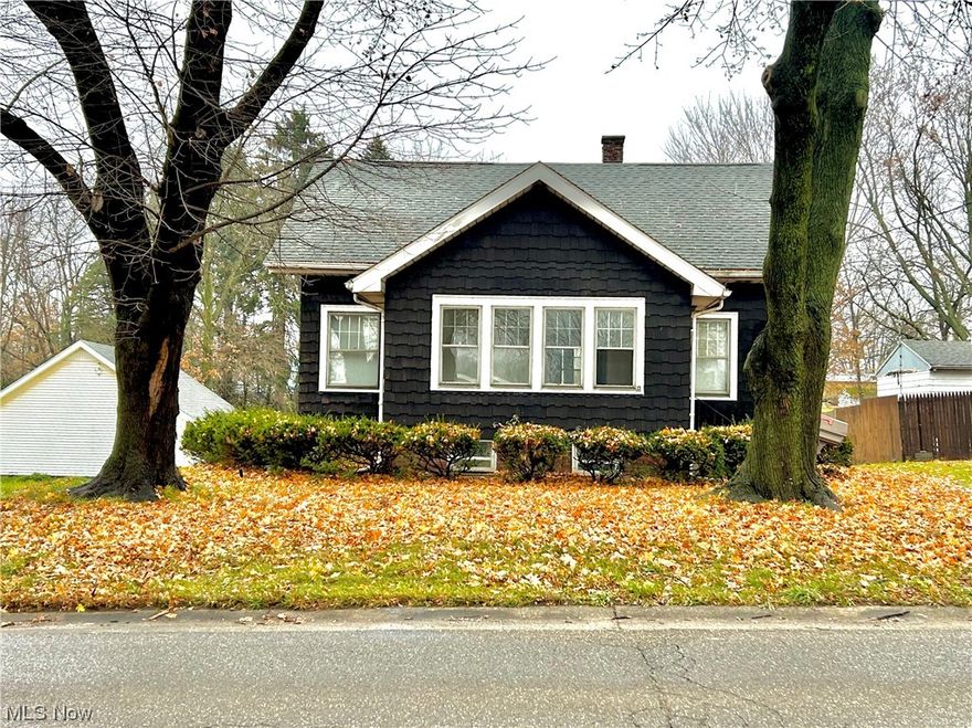 Love where you Live! If you're an investor looking for a property to invest in, this home is situated on a 1-acre lot and comes with a detached two-car garage. The house features original woodwork and hardwood floors, giving it a classic touch. There's also a spacious sunroom to relax and enjoy the view. Located in  Plain Twp. school district. Don't miss out on this opportunity to invest in a great property!