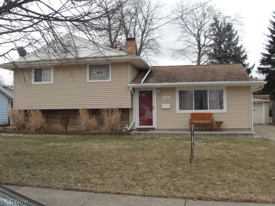 Beautifully updated  large split level* Move in ready* Renovated kitchen with granite counters and Kraftmade wood cabinets* Good sized eat in kitchen area* 1st floor Sun room with fireplace and double door leading to relaxing patio and fenced in yard*Lower level Family room with and full bath and 4 yr old carpet* Updates include A/C, vinyl siding and windows, newer carpeting* 2 car garage* Very motivated sellers* Quiet street close to schools, shopping, airport and highway*Play ground at end of the street* Must See!