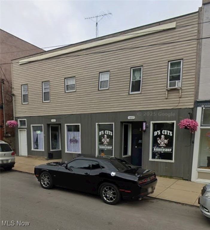 Don’t miss this turnkey investment opportunity! Well-maintained 4,520 sq ft mixed-use commercial building situated on 0.13 acres. The property features two commercial storefronts on the lower level, currently leased by a bakery and a barber shop, and four apartments on the upper level, including two 2-bedroom units and two 1-bedroom units. Each apartment comes equipped with a refrigerator and electric stove, and tenants are responsible for their own electric.
The building has undergone numerous updates in recent years, including a new furnace and AC unit in the commercial spaces in 2022, and upgraded furnaces for the apartments, all serviced annually and under 10 years old. The large hot water tanks were replaced in 2022, and the apartments received updates between 2020 and 2023, including new paint, flooring, and appliances. The roof was replaced in 2010, and additional exterior improvements include new gutters and a rebuilt deck in 2020, as well as new exterior windows and doors in 2021, with several window replacements between 2020 and 2022.