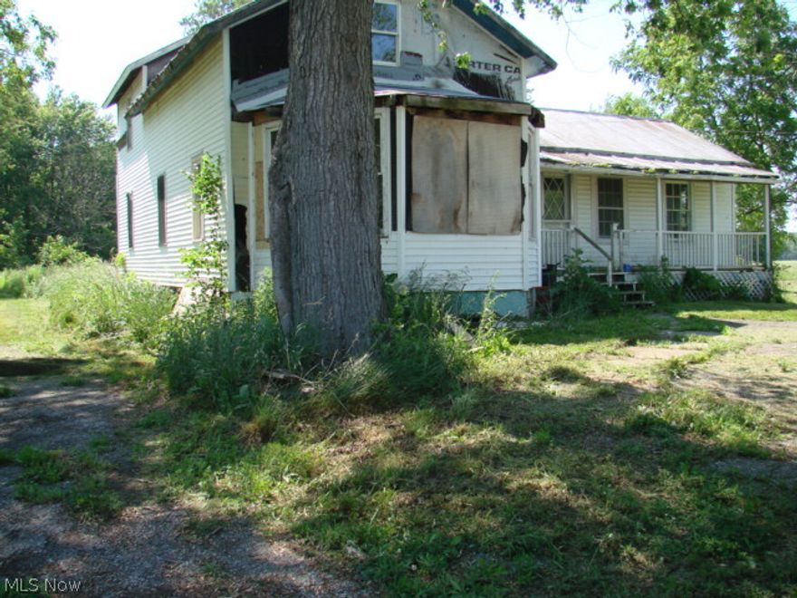 Beautiful 5 acre lot, house has potential remodel or rebuilt.  Come take a look.