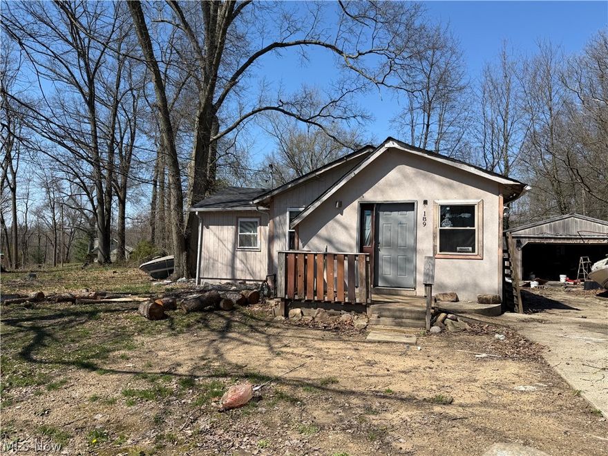Prime Portage Lakes Potential | Coventry Township
Opportunity knocks on this oversized corner lot!

Located just a stone’s throw from the water and minutes from the public boat launch, this property is the ultimate "diamond in the rough" for anyone looking to plant roots in the Cottage Grove Lakes community. Sitting on a generous, level corner lot, this home offers the footprint and yard space that is increasingly hard to find in this high-demand area.

The Highlights:

Location, Location: Prime access to the lakes. Whether you’re a boater, fisherman, or just love the lake-town vibe, you’re perfectly positioned to enjoy the best of Coventry.

Sprawling Corner Lot: Ample room for a detached garage, boat storage, or a massive wrap-around deck.

The Vision: This is a full renovation project. Bring your contractor and your imagination—the "bones" are ready for a modern transformation or a complete reimagining.

Whether you're looking for your next flip, a long-term rental, or a custom lake-area cottage, 189 W Vista Ave is ready for its next chapter. Property is being sold As-Is.
Coventry Local School District