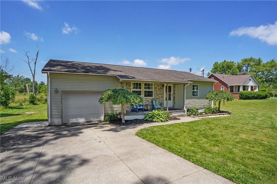 Surround yourself with love and laughter in this ranch style home on 3 acres! Enjoy the front porch a with stone accent wall or move into the living room with hardwood floors, open to the eat-in kitchen with stainless appliances included. Three first floor bedrooms, full bath and a huge storage closet can be found on this level as well as the entrance from the attached garage. The finished, water-proofed (with lifetime transferrable warranty) basement offers so much extra living space including the second full bath, laundry room and more. This home has a new septic system, a water softener with reverse osmosis, and offers a home warranty for a worry-free purchase. Many updates have been completed including new flooring, fresh paint, updated electrical both inside and out. Enjoy that cup of coffee on the back deck or a gathering of friends around the firepit, the birds will greet you as you share this piece of country in West Branch School District. Schedule your showing today, this is one you won't want to miss!