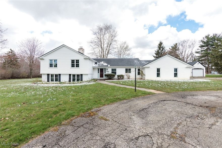 Welcome to your new home in charming Gates Mills! Nestled on a picturesque 2.5-acre lot, this spacious mid-century residence offers comfort, style, and serenity. A circular driveway leads you to the front entrance, where you're immediately greeted by a bright and airy foyer featuring vaulted ceilings and seamless access to every corner of the home.
Just off the foyer, the expansive living room boasts panoramic views of the lush, private backyard—perfect for enjoying nature in every season. Step through to the covered back porch or head directly into the open-concept dining room, which flows effortlessly into the large, eat-in kitchen. The kitchen is equipped with abundant storage and ample workspace, ideal for both casual meals and entertaining. A convenient mudroom connects the kitchen to the attached garage, keeping everyday living organized and efficient. Upstairs, you’ll find three generously sized bedrooms and two full bathrooms, including a peaceful primary suite.
The lower level offers a cozy family room with a wood-burning fireplace and sliding glass doors that open to a tranquil back patio and yard—an ideal space for relaxing, hosting, or cultivating a garden retreat. This level also includes a dedicated home office, a half bath, and a utility room. Additional features include newer windows (2023), a newer roof (2023), and an oversized storage shed. Situated on a quiet street, this property provides the perfect balance of privacy and convenience, just minutes from shopping, dining, top-rated hospitals, and easy access to I-271. This is more than a house—it's a peaceful retreat waiting to welcome you home.