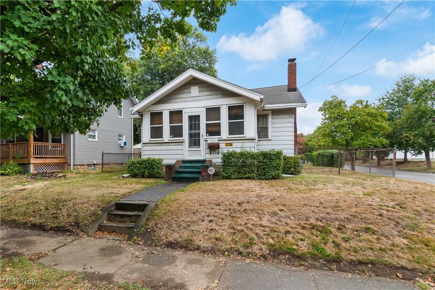 Welcome to 1239 Lily St. Akron, Ohio. This Ranch home is located in the heart of Firestone Park just minutes from 77 and is ready for a new owner. A perfect match for those looking for an investment opportunity or someone in need of a fixer upper. The home has 2 bedrooms, 1 bath on the main level which has been updated recently and an extra shower in the basement. A large family room with a cozy brick fireplace is a key feature in this home. The yard is fenced in and outside boasts a detached 2 car garage. Newer furnace (2022) and water heater are ready to go!