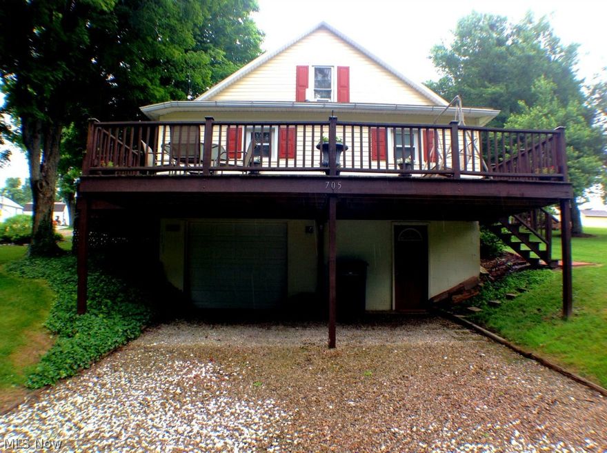 Move right in to an immaculate home located on multiple lots! This home offers 3 very spacious bedrooms, one of which is a master suite w/ private full bath in addition to another full bath on main floor! Easy access from within the basement garage entrance. Enjoy the beautifully manicured landscape including several mature trees from the exquisite view from the wrap around deck.  Conveniently located just moments from the center of New Lex - truly a beautiful country-view setting within the city limits!