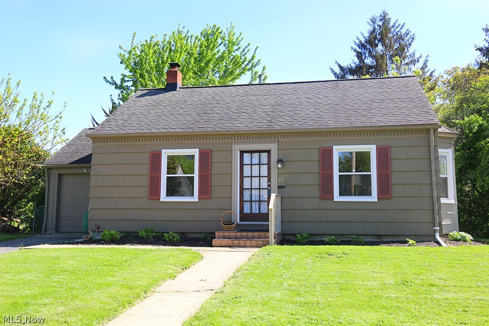 Charming cottage located on a corner lot. You will love the oversized living room that can easily house a dining table. The step saver kitchen has a great work area. The main bath is clad in tile and granite. The two bedrooms are ample in size and have their own closets. The lower level is plumbed and could house a full bath, currently the lower level bath just has the commode hooked up.