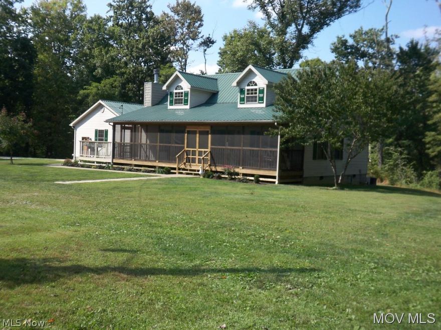 Very private setting in mostly wooded 6.2 acres, 2005 Cape Cod built by Frank Douglas. Open floor plan w/vaulted ceilings, beautiful Oak hardwood and six panel Oak doors, large owner suite on main level as well as laundry/mud room from garage, 24x32 pole building w/13" shed on one side, whole house generator, 8x40 screened porch on front and multiple decks. All measurements approx.  Elem: Worthington Elementary School  Elem/Bus: Y  JrHigh: Hamilton Jr. High School  JrHigh/Bus: Y  High: Parkersburg High  High/Bus: Y  Fire: VOL  Police: SHF  ;SQFT=Fin L1:1560, Fin L2:780, Fin Above:2340, Fin Total:2340, Unfin Above:0;GAR= 2 Car Att, Opener(s);PRKG= Off Street, Parking Pad, RV Parking