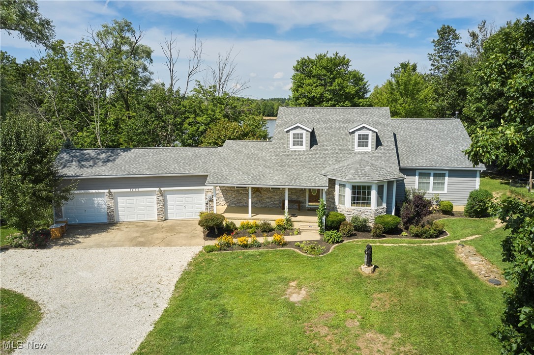Welcome to 7456 Friendsville Rd — a charming 4-bedroom, 3.5-bath Cape Cod perfectly set on over 2.5 picturesque acres with its very own stocked pond! You’ll fall in love with the inviting open floor plan, starting with the spacious kitchen featuring abundant cabinetry, generous counter space, and a seamless flow into the large, sun-filled living room. Just off the entry, a cozy office/library offers the perfect spot for work or quiet reading. The main level boasts two generously sized bedrooms, including the expansive master suite with a walk-in closet and private bath. Upstairs you’ll find two additional bedrooms, each brimming with character. Step out back to your private deck and take in the peaceful views of the pond — an ideal backdrop for entertaining, relaxing, or enjoying a morning coffee. The backyard has been thoughtfully cleared to create an expansive, usable space while still preserving a sense of privacy. All of this is complemented by a 3-car attached garage and a location that’s both private and conveniently close to town. A truly beautiful setting ready to welcome you home!